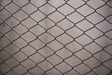 The image behind the iron cage feels lonely and sad like incarcerated.