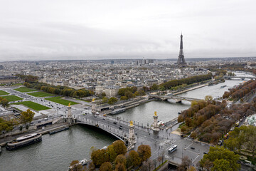 Eiffel tower over the river the Seine and the alexander bridge