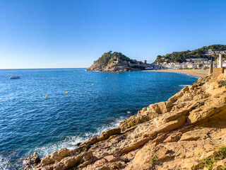 Fototapeta na wymiar Tossa de Mar Catalan coast fishing village Mediterranean sea turquoise blue water beach tourist Barcelona Europe Spain