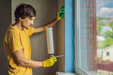 Builder or handyman is engaged in the repair or installation of windows