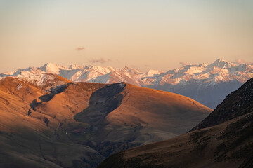 Winter snow covered mountains at sunset. Beautiful winter landscape. Vintage filter