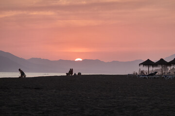 Sunset on the beach of Benajarafe. Malaga. Andalusia. Spain.