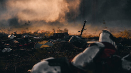 After Epic Battle Bodies of Dead, Massacred Medieval Knights Lying on Battlefield. Warrior Soldiers Fallen in Conflict, War, Conquest, Warfare, Colonization. Cinematic Dramatic Historical Reenactment - obrazy, fototapety, plakaty