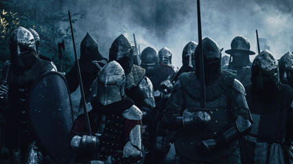Ancient Invading Army of Medieval Knights Marching on Battlefield. Plate Body Armored Warriors...