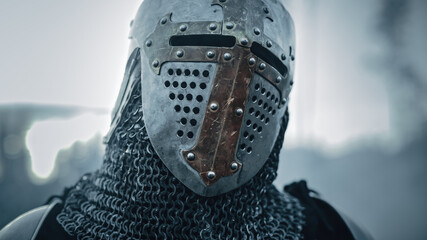 Portrait of a Medieval Knight on Battlefield, Closed Helmet Ready for Battle. Portrait of Mighty...