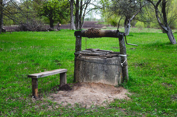 A well in an abandoned village left by residents in russia