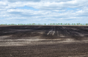 In spring, empty plowed agricultural land is prepared for the new harvest