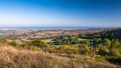 Fototapeta na wymiar Eastbourne, East Sussex, England, UK. An elevated view of the English south coast seaside resort town taken from the South Downs.