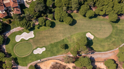 Golf course beautiful Aerial view of golf field landscape with sunrise view in the morning shot....