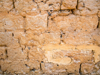 Close-up photography of a rustic adobe wall, captured in a farmhouse near the colonial town of Villa de Leyva in central Colombia.