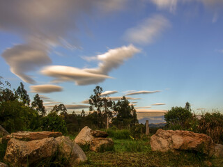 Multiple exposure of some clouds and rocks at sunrise over the central mountains of Colombia near the town of Villa de Leyva.