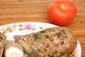 Homemade Meatloaf stuffed with egg and vegetables
