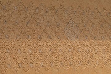 yellow wall that was built in front of the building is a interpretive artwork and is punched into a kind of print and is a beautiful natural marble floor created by the painter.