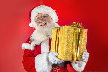 Emotional senior male model old man with a natural white beard in the role of Father Christmas