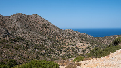 Naklejka premium Scenic view on a rocky landscape and sea of Crete in summer