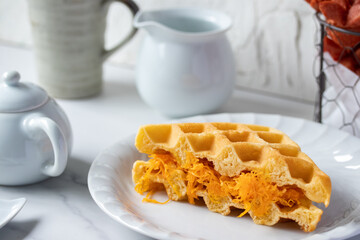 Thai foi thong waffles in white plate and coffee mug snack concept