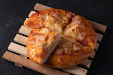 Three american style pizzas, Hawaiian thick crust pizza