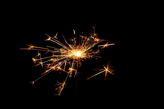 Bright festive fireworks in the dark sky