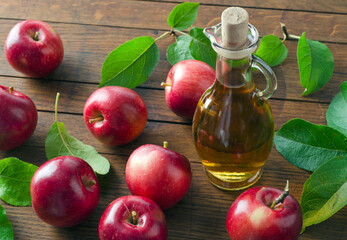 Ripe apples and apple cider vinegar
