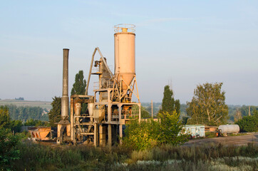 Fototapeta na wymiar View of a small asphalt plant 