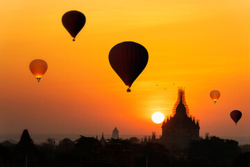 Sunrise many hot air balloon in Bagan, Myanmar. Bagan is an ancient with many pagoda of historic buddhist temples.