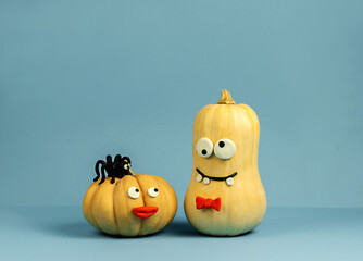 Funny pumpkins on a blue background, Halloween.