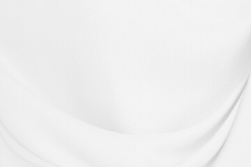 Beautiful white fabric waves, soft focus, used for backgrounds. White cloth background	