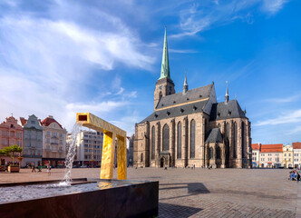 Fototapeta premium Market square with cathedral in Pilsen, Czech republic. Marktplatz in Pilsen, Tschechien