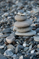 Fototapeta na wymiar Stacking up stones at Qixingtan beach in Hualien city, Taiwan