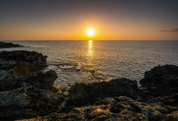 Fototapeta premium Beautiful sunrise over the rocky coast of the Mediterranean sea