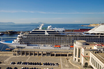 Small luxury modern cruiseship or cruise ship liner Riviera Marina in Port of Naples, Italy with...