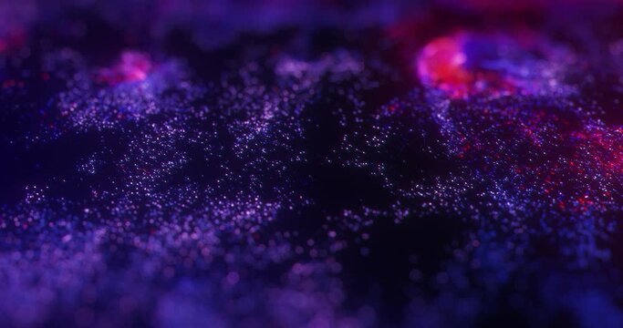abstract motion of Neon purple and red particles with bokeh. Seamless 4K loop particle animation