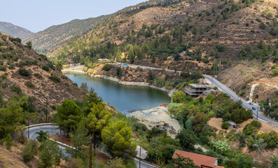 Fototapeta na wymiar a reservoir near the mountain village of Oikos in the Troodos mountain range in Cyprus