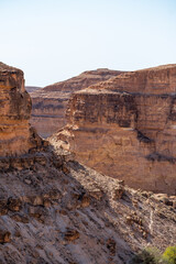 Scenic view of Old stone houses, Palm trees Oasis , Mountains from Ghoufi Canyon in the Aures region, Algeria