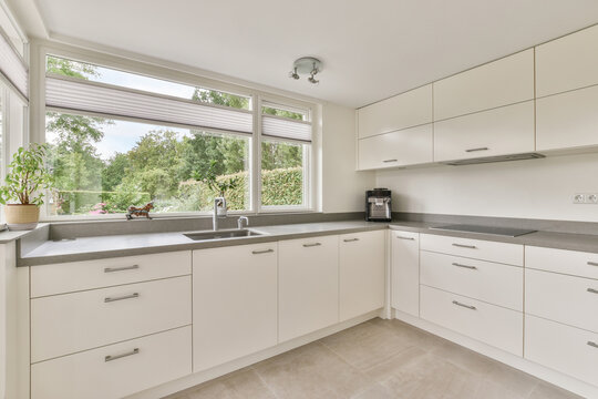 Modern kitchen interior with cupboard at home