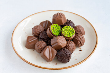 assortment of luxury chocolates on a white background.