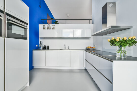 Modern kitchen interior with fridge at home