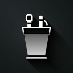 Silver Pencil case stationery icon isolated on black background. Pencil, pen, ruler in a glass for office. Long shadow style. Vector