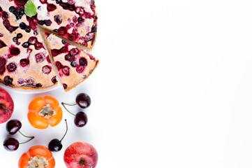 On a white background with space for writing the text fruit pie, cherry, persimmon, apple.