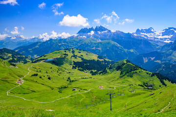 Fototapeta na wymiar Landscape of mountains of Alps in summer with gondola lift in Portes du Soleil, Switzerland, Europe
