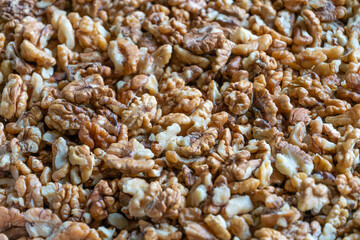 Background, texture of peeled walnuts close-up