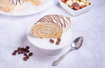 cake roll with coffee flavor on white plate
