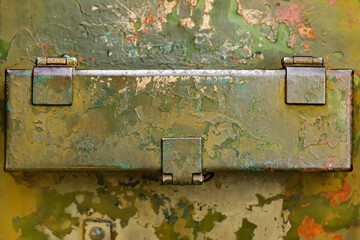 Photo of old and rusty military vehicle armored surface plate.
