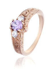 Gold ring with precious stones on a white background