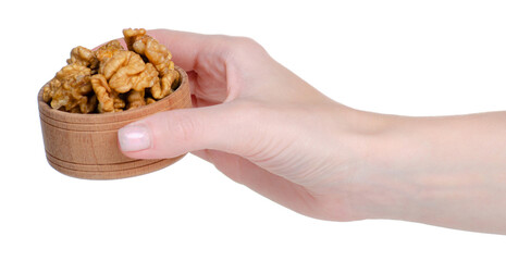 Wooden bowl with walnuts healthy food in hand on white background isolation