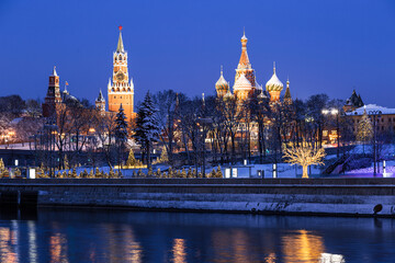 Night New Year's Moscow. Moskvoretskaya embankment of the Moskva River in New Year decorations. Russia