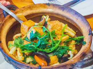 Close up shot of seafood hot pot with tofu