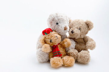 Family teddy bears on the white background with copy space. Doll brown fluffy for baby play. Love, families, valentine concept.