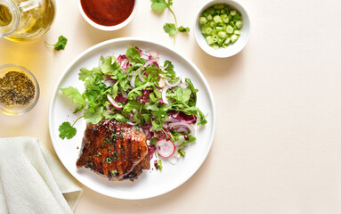 Roasted pork steak with salad from fresh vegetable