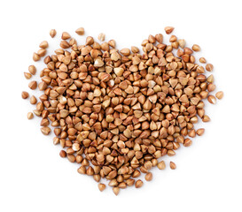 Buckwheat groats in the shape of a heart on a white background, isolated. Top view - obrazy, fototapety, plakaty